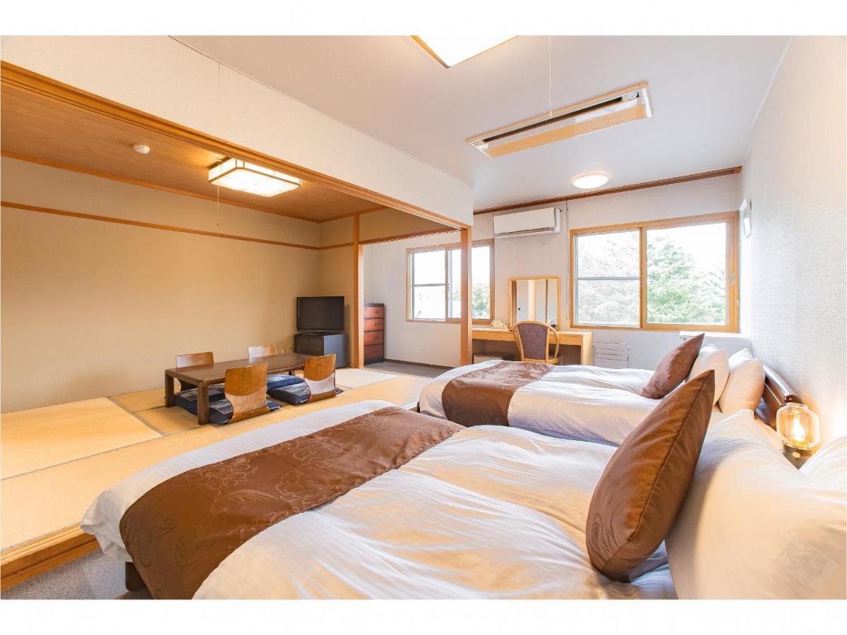 Bed and breakfast Nomad Hakuba Extérieur photo