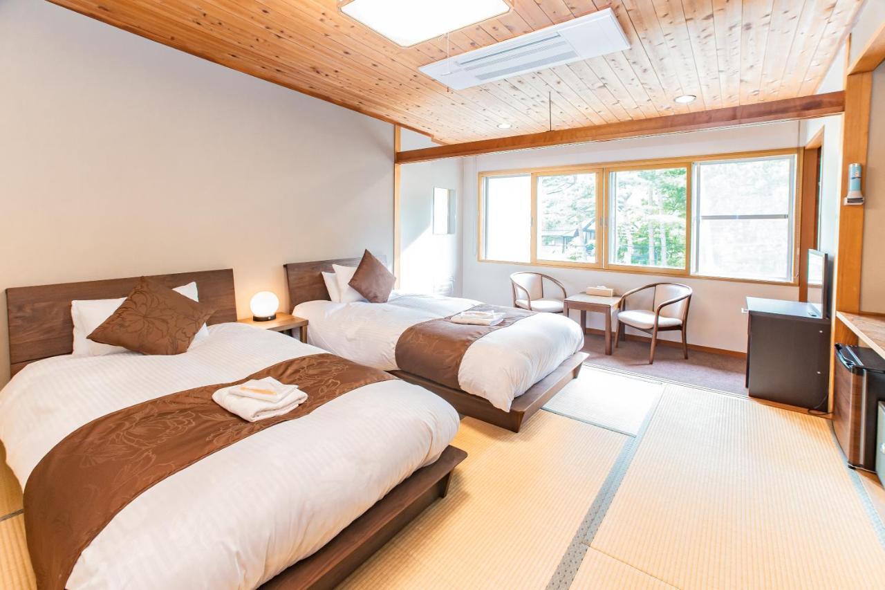 Bed and breakfast Nomad Hakuba Extérieur photo